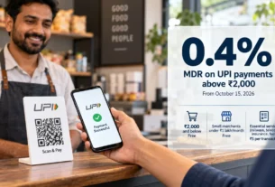 UPI MDR 2026 - merchant scanning UPI QR code payment on smartphone, India